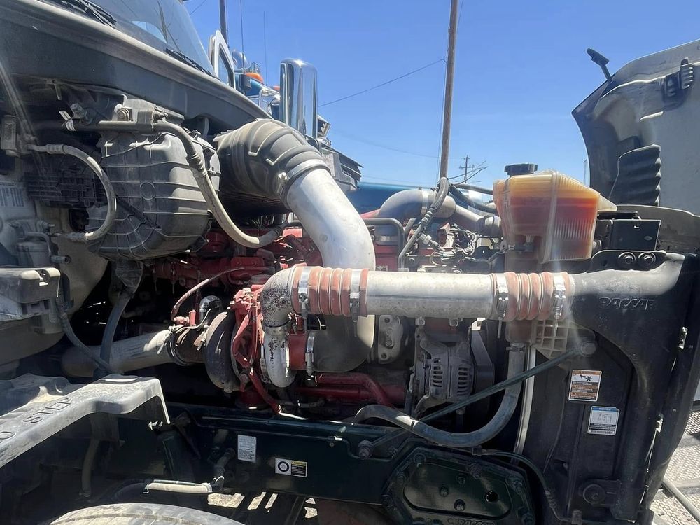 Semi truck engine bay opened up for repair